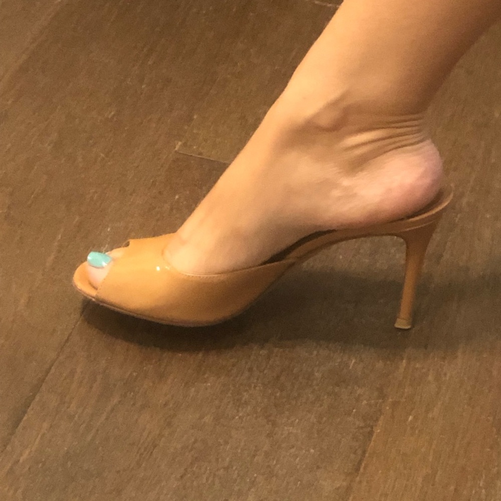 Gianvito Rossi peep-toe sandals with covered heels.